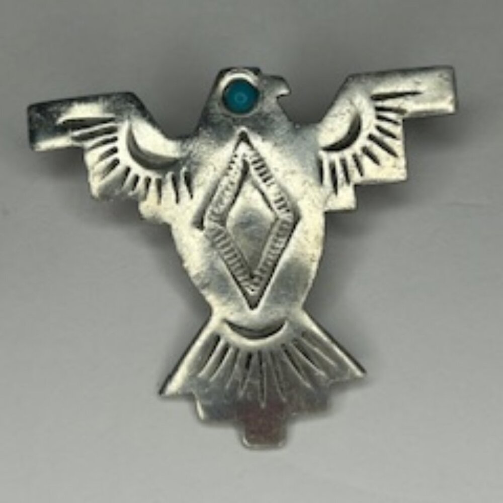 Vintage sterling silver Thunderbird brooch.